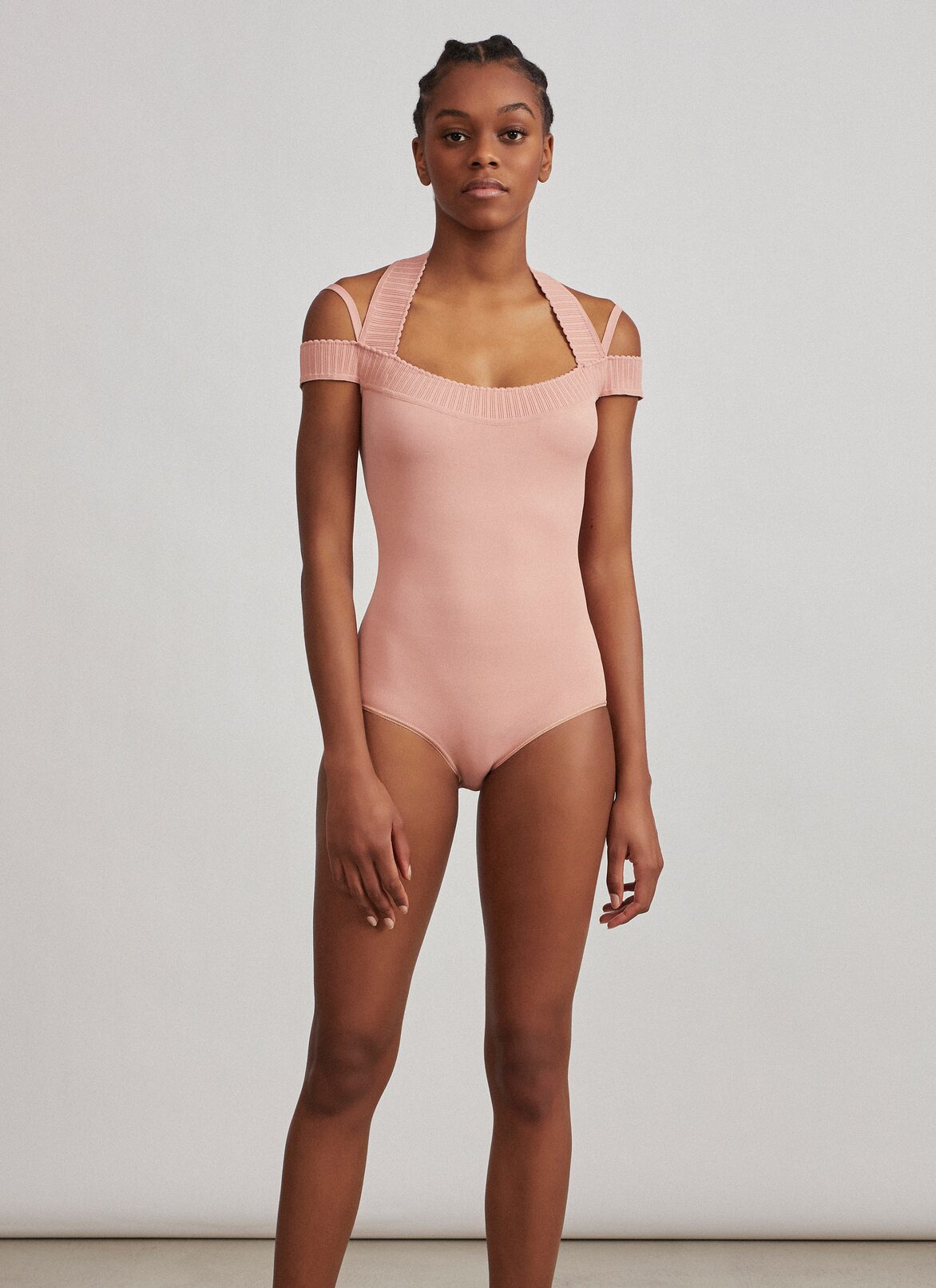Cold-shoulder knit bodysuit 
 ALAÏA PALE PINK COLD-SHOULDER KNIT BODYSUIT